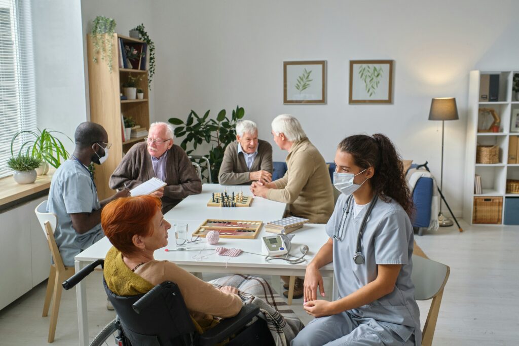 Elderly women smiling in a modern aged care facility