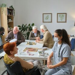 Elderly women smiling in a modern aged care facility